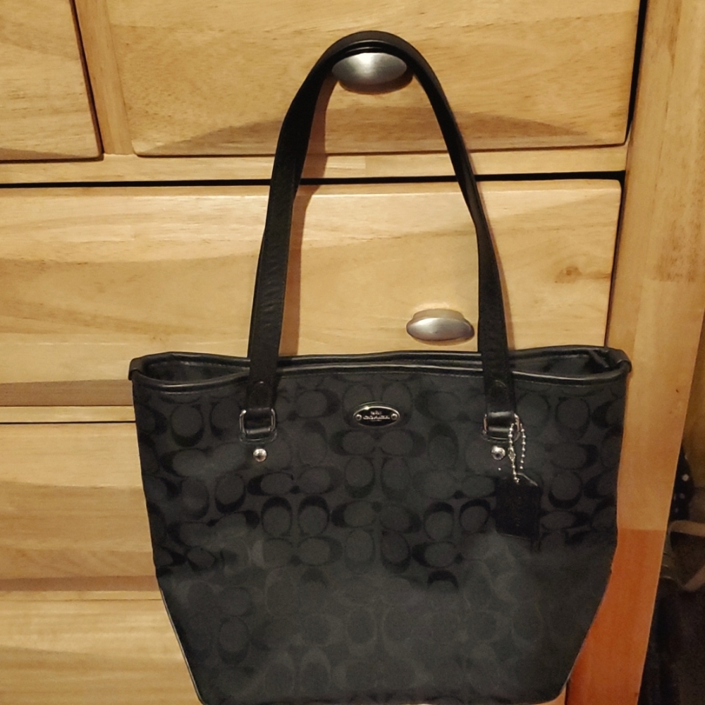 Coach shoulderbag,  13" across × 10" tall x 4 1/4" wide, Black, never used.
